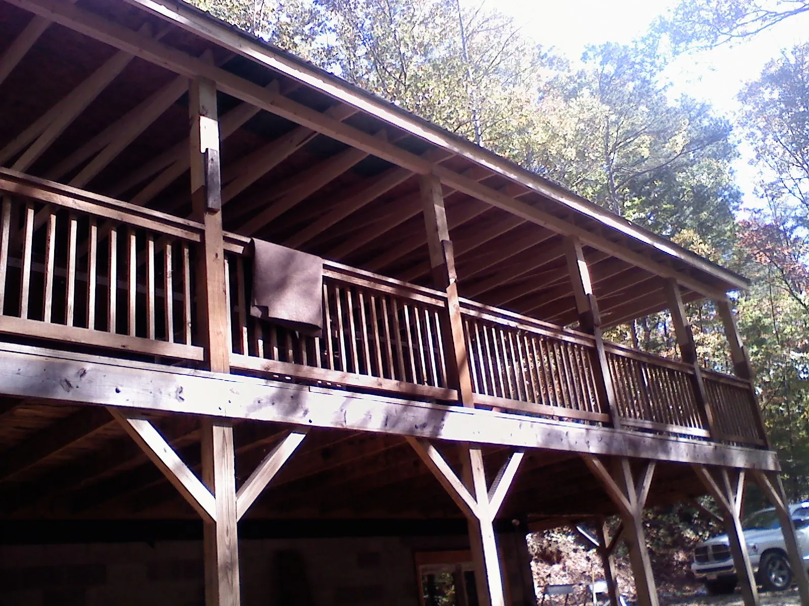 Timber framing under a new elevated porch and deck — Roof Leak Repair in Varysburg by Roofing Brothers